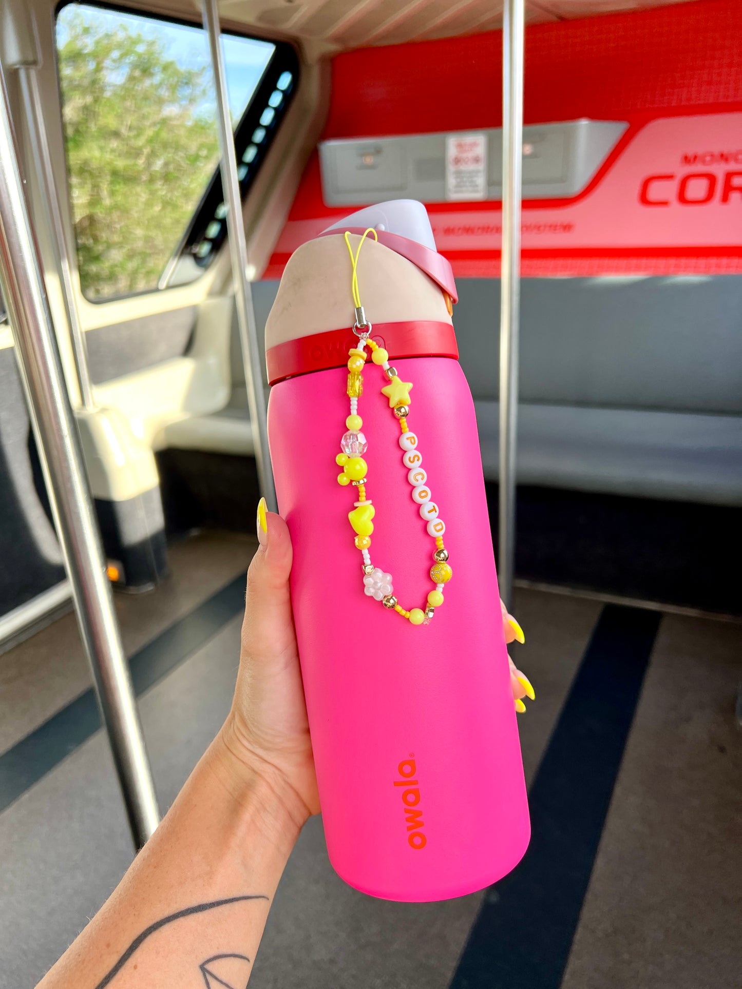 Please Stand Clear of the Doors Monorail Water Bottle & Phone Charm