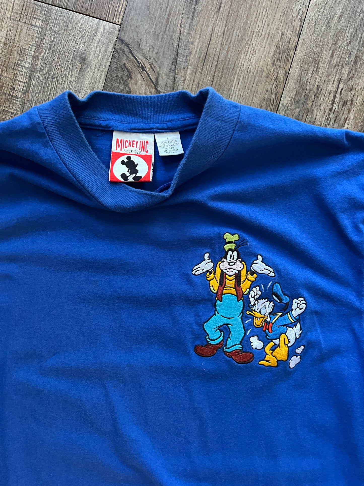 665 -Blue Embroidered Shrugging Goofy & Angry Donald Pocket Tee - L
