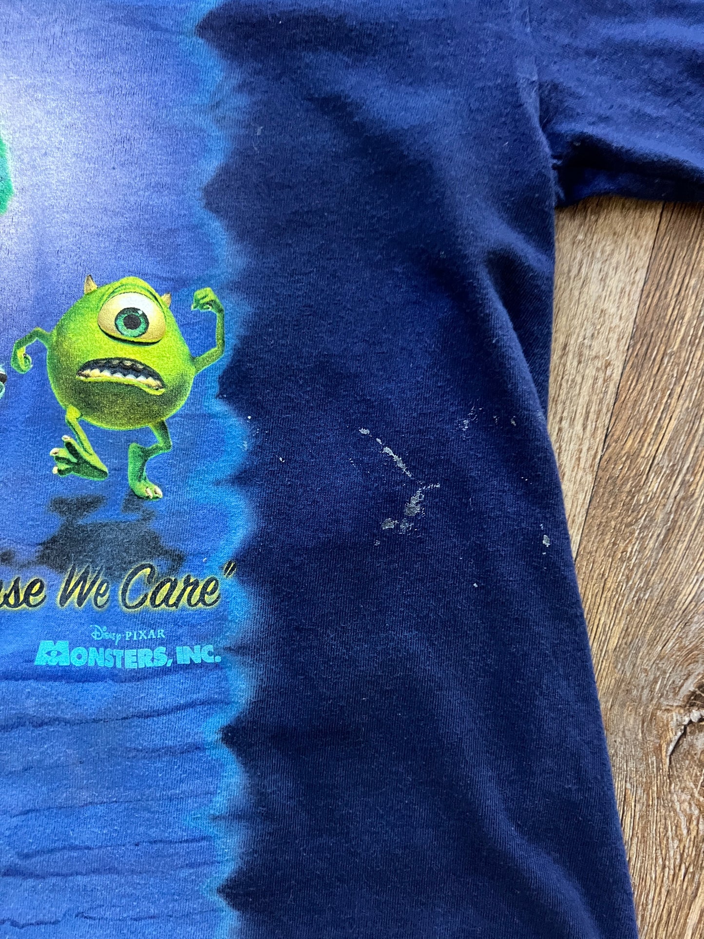 675 -Blue Tie-Dye Monsters Inc We Scare Because We Care Tee
