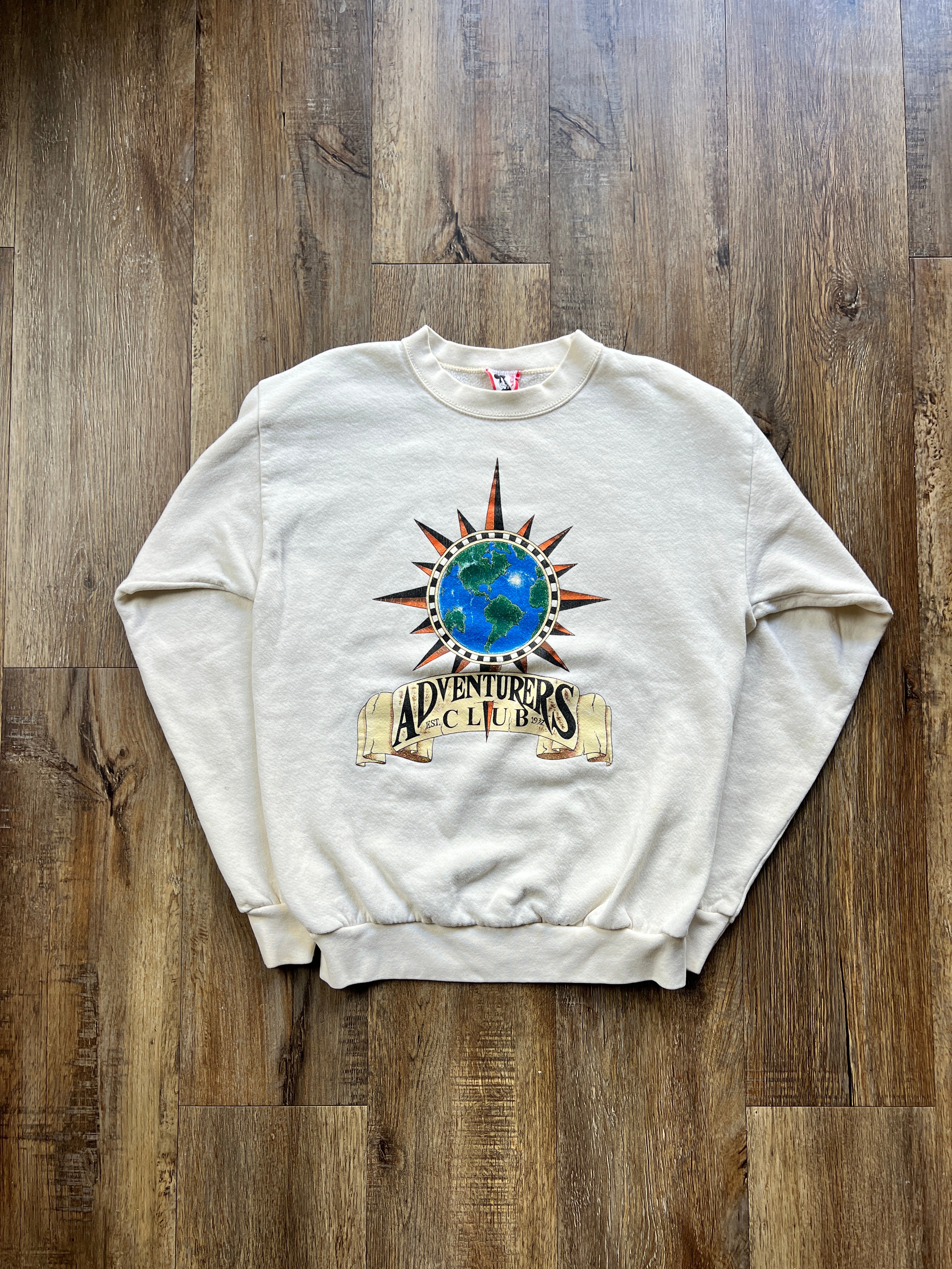 27 -Tan Disney Designs Pleasure Island Adventurer's Club Crewneck SZ M