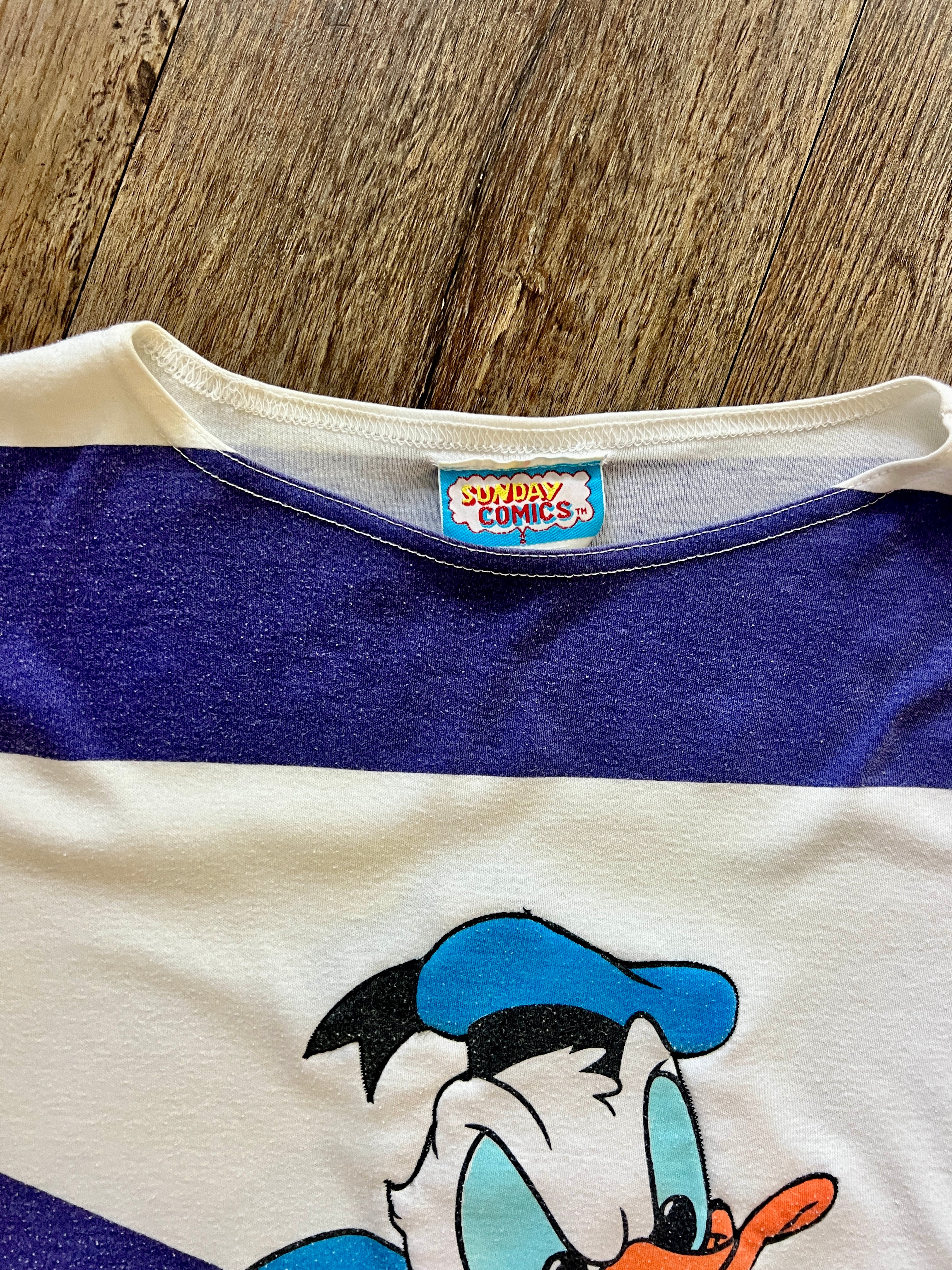 870 -White & Blue Donald Duck Climbing Through Stripes Shirt - M