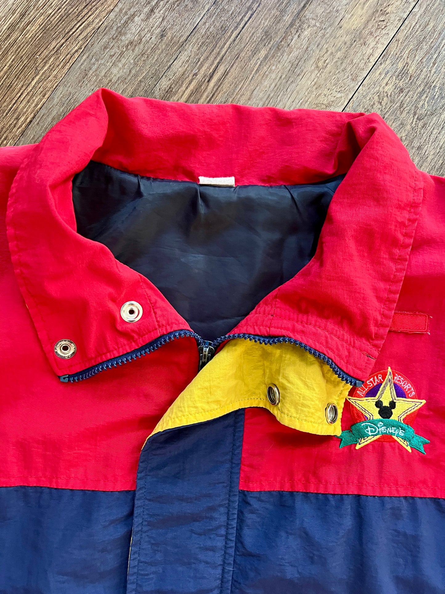 904 -Red, Yellow, & Blue All-Star Resorts Cast Jacket - L