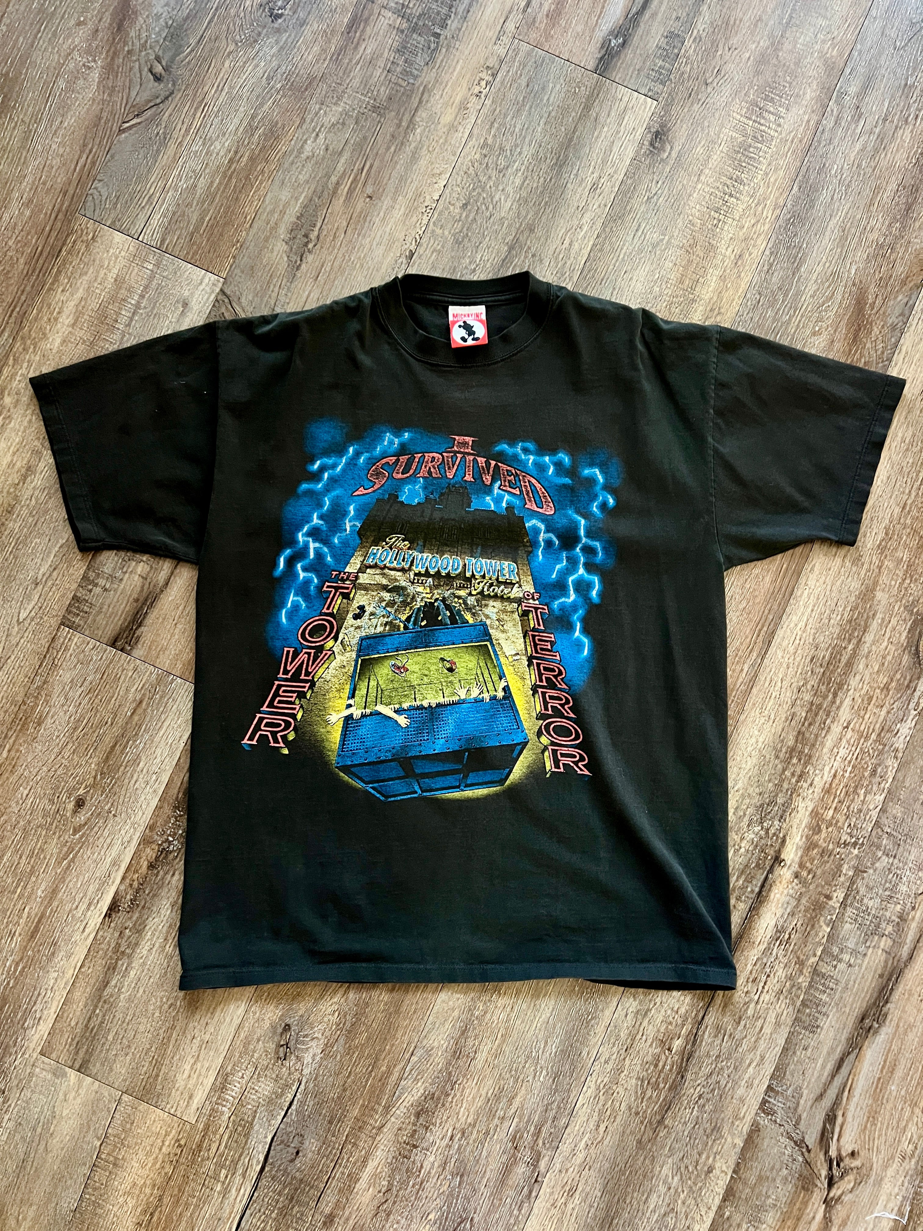 927 -Black I Survived Tower of Terror Dropping Elevator Shirt - XL