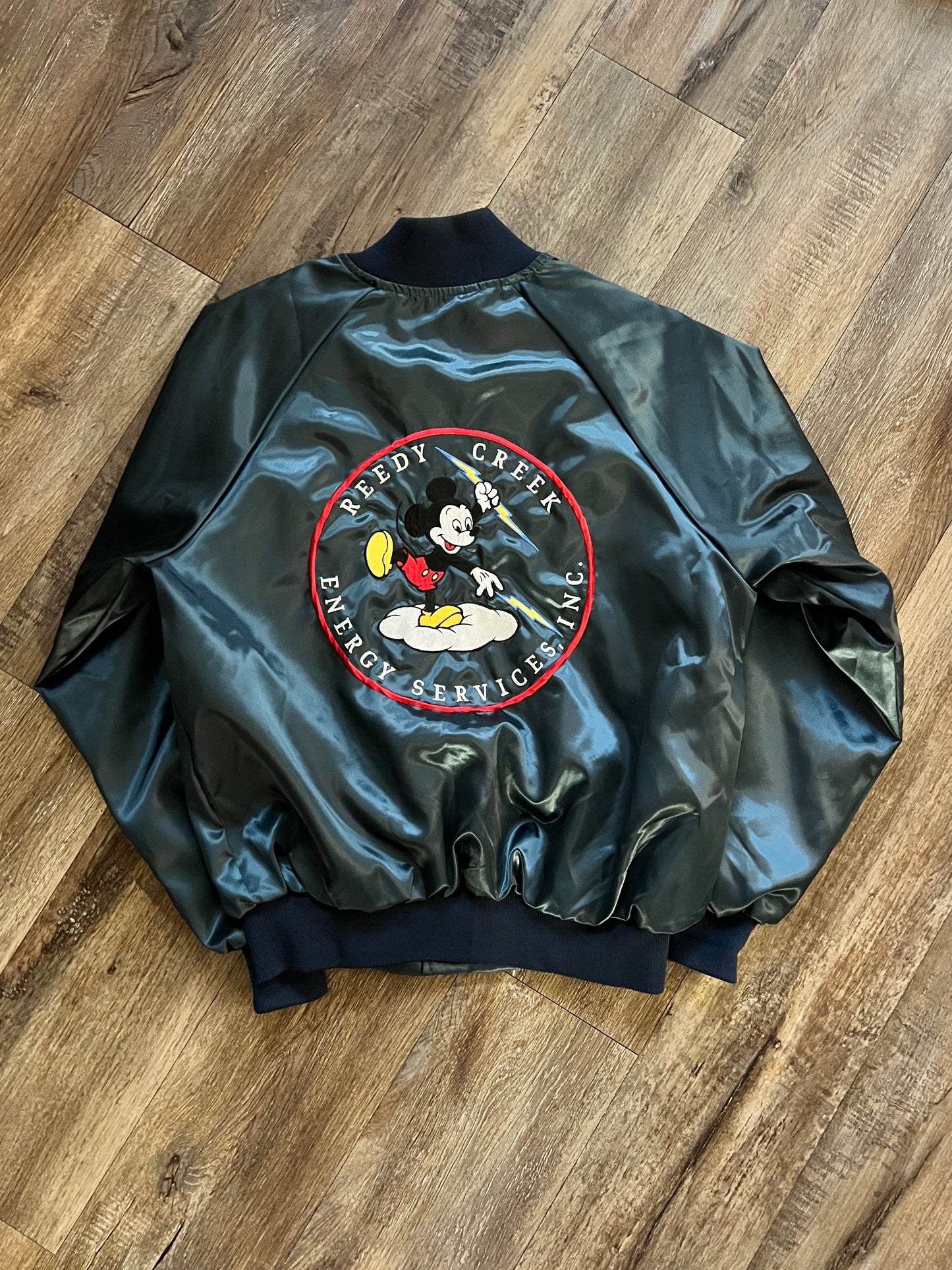 940 -Blue Satin Embroidered Reedy Creek Energy Services Bomber Jacket - L