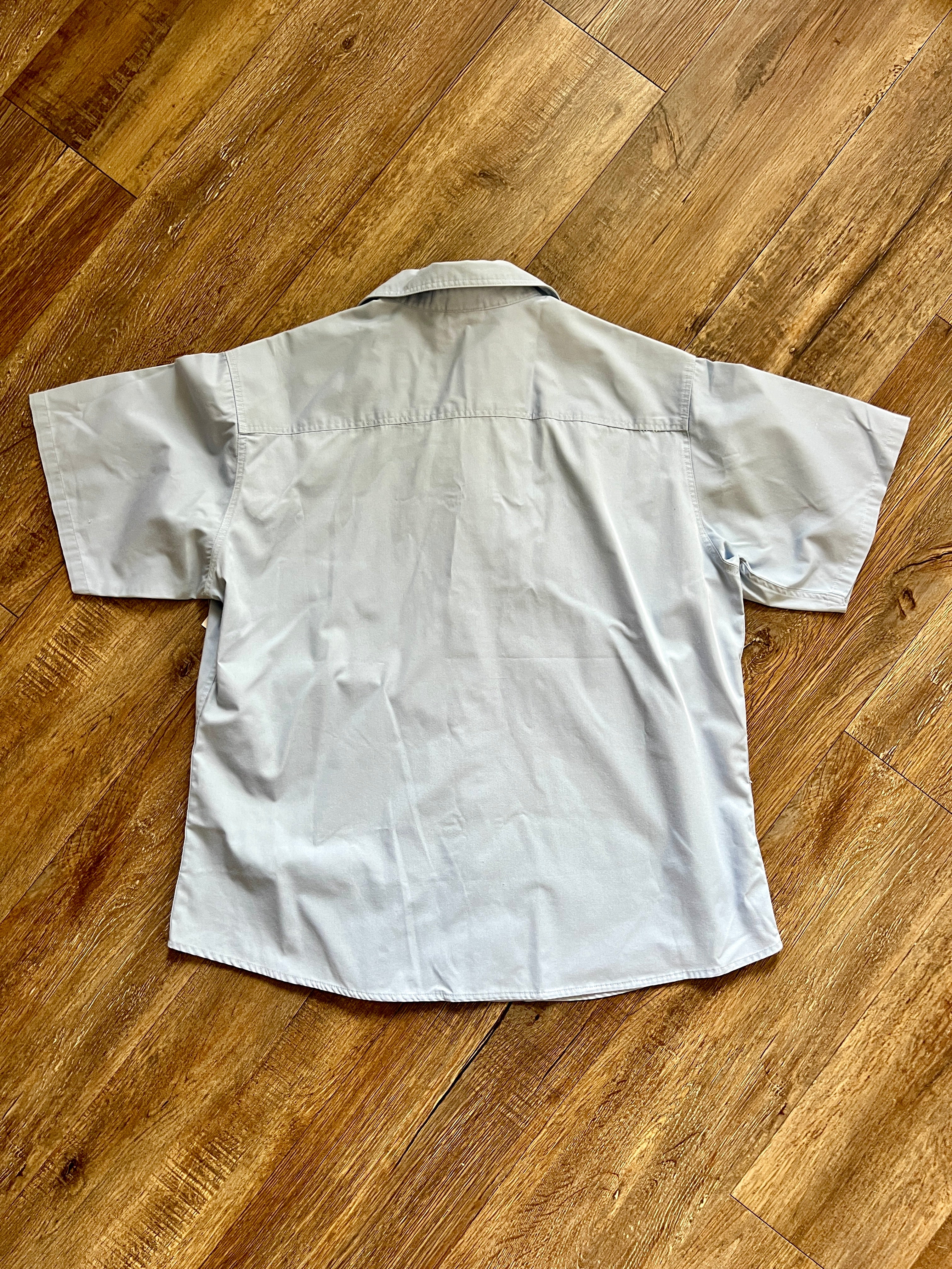 1289 - Blue Embroidered Mickey Health Services Cast Member Button Up - L