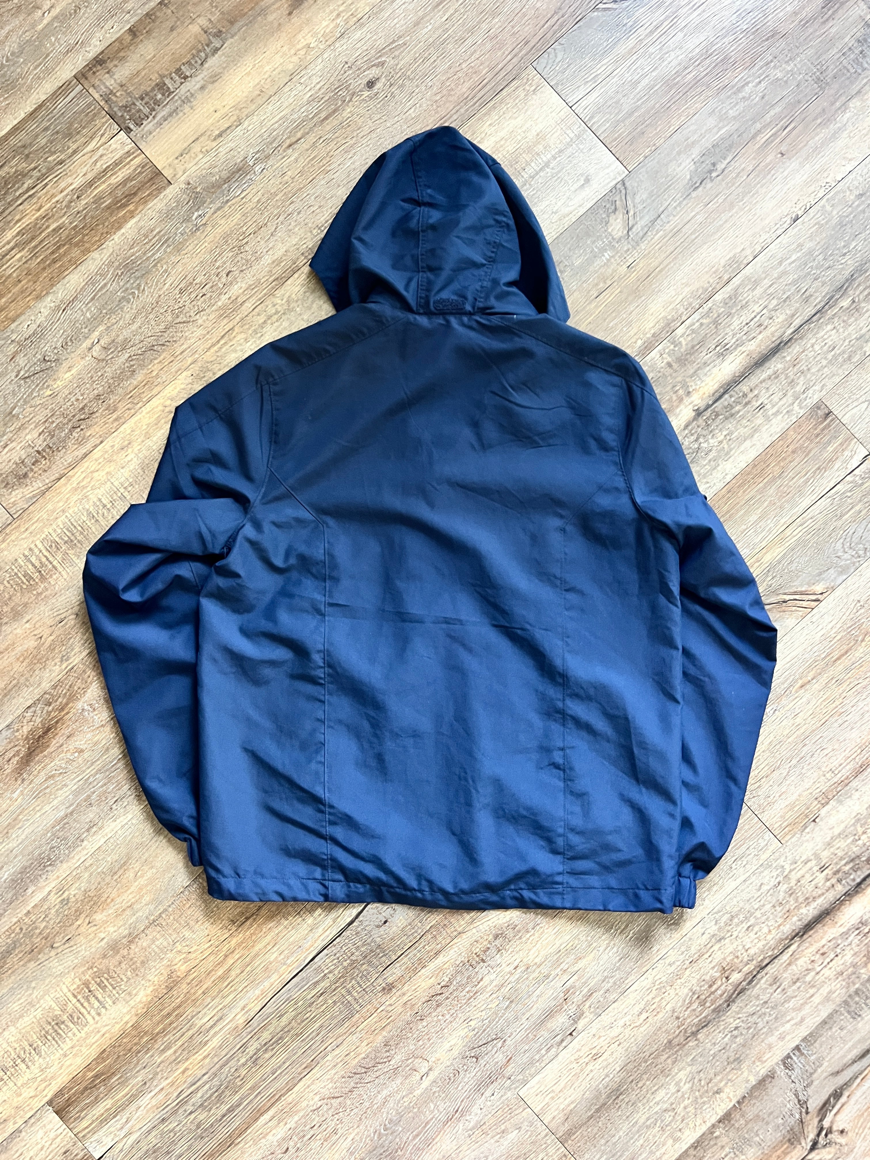 1316 - Navy Disney Springs Opening Team Zip Up Collapsible Hood Windbreaker - S