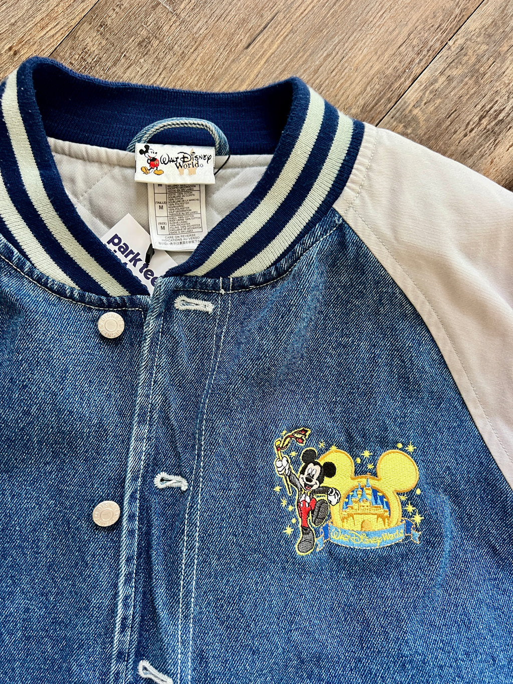 1321 - Denim Embroidered WDW The Happiest Celebration on Earth Varsity Jacket - M