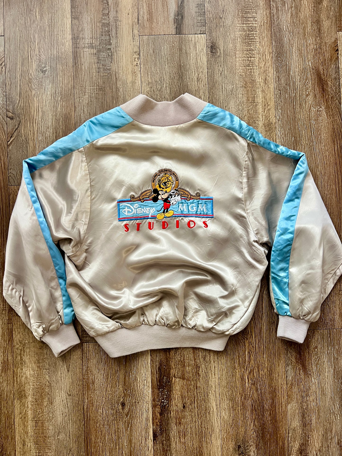 364 -Silver Satin MGM Studios Bomber Jacket - M