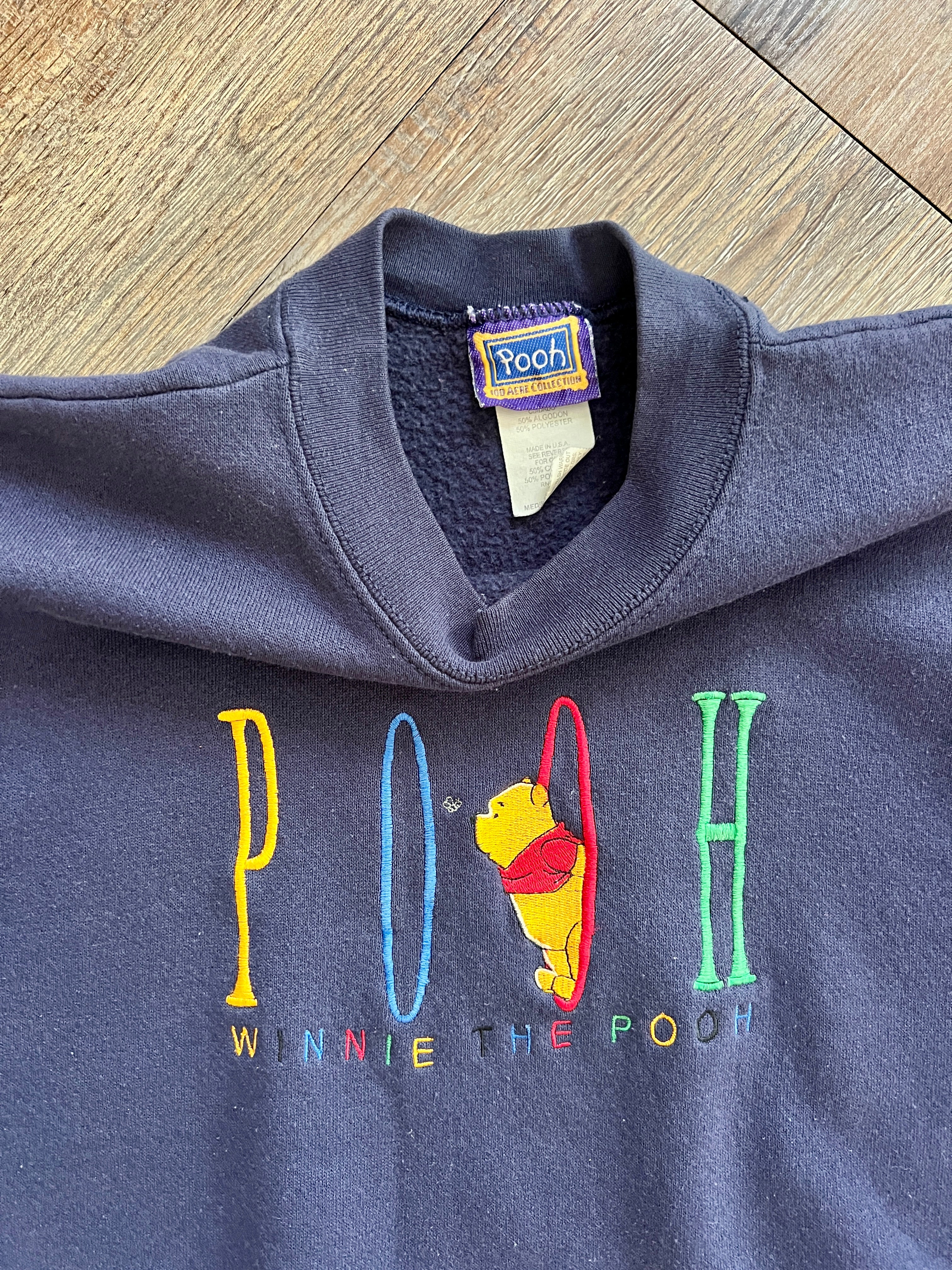 1342 - Navy Winnie the Pooh Multi Color Embroidered Crewneck - M