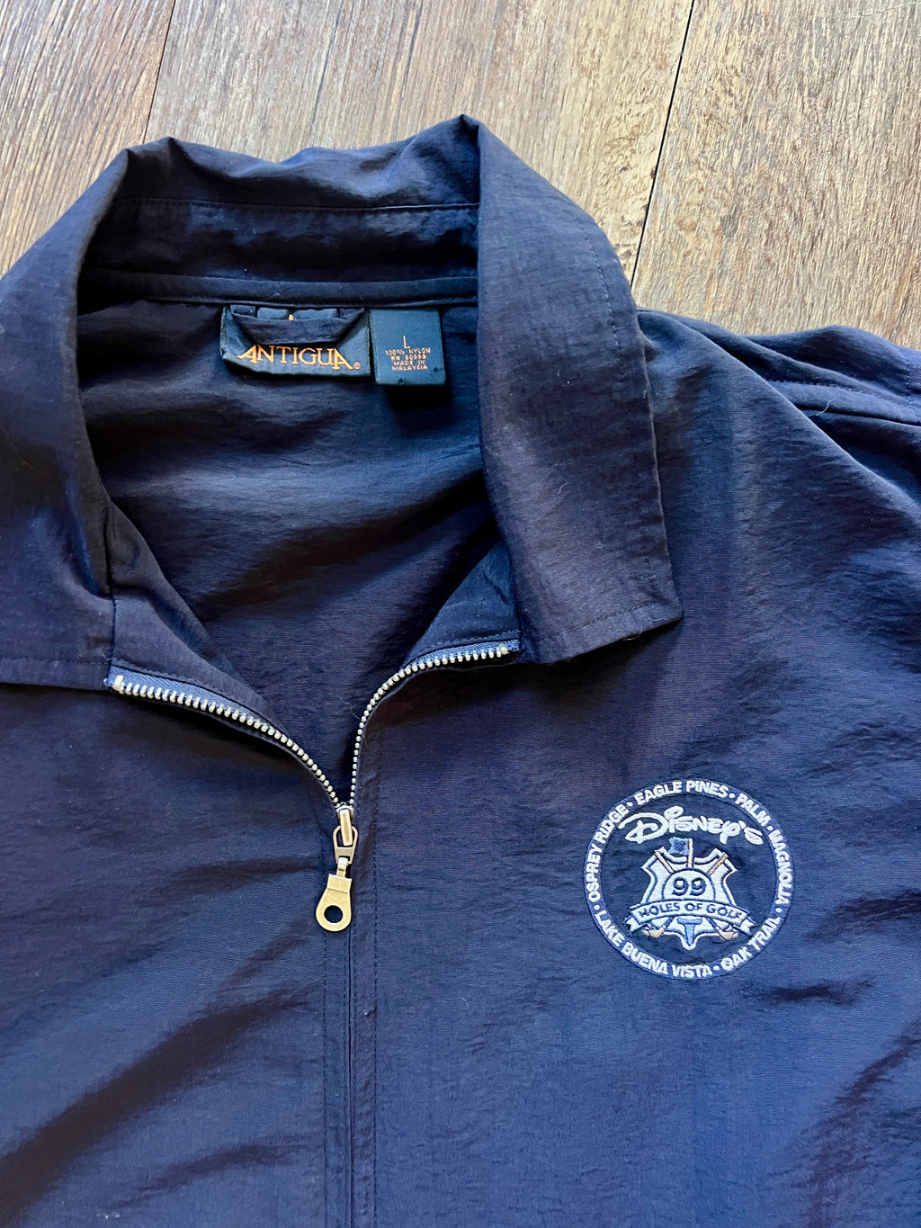 1000 -Navy Embroidered 99 Holes of Golf Courses Golf Windbreaker - L