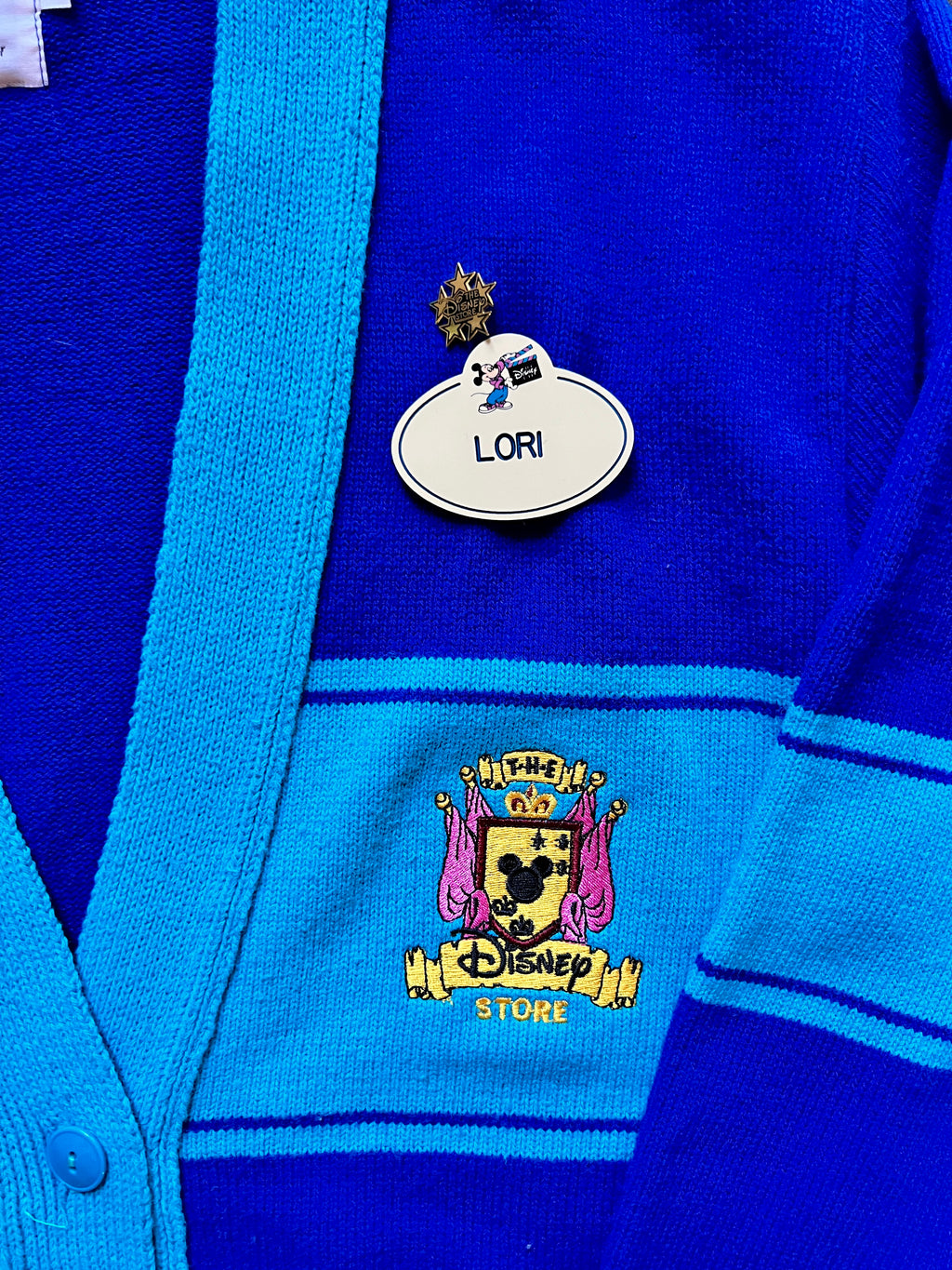 485 -Blue The Disney Store Cast Member Sweater, Nametag, & Disney Store Pin - S