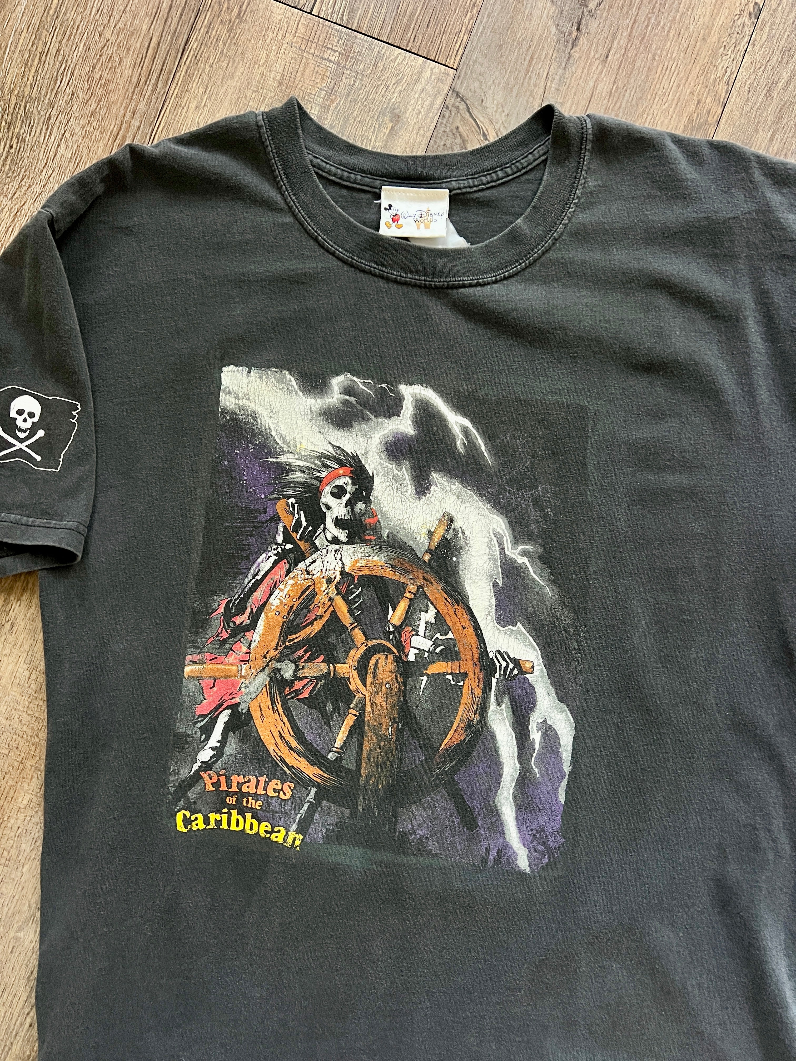 1079 -Black Pirates of the Caribbean Skeleton Steering Box Back Hit Shirt - L