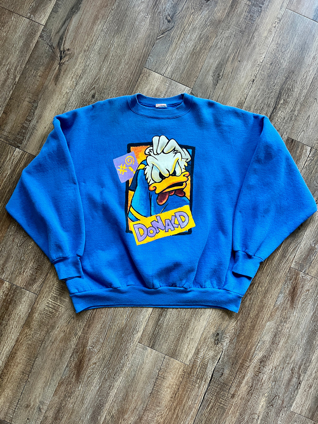 1083 -Blue Angry Donald Scratching Head Disneyland Crewneck - NT / XL