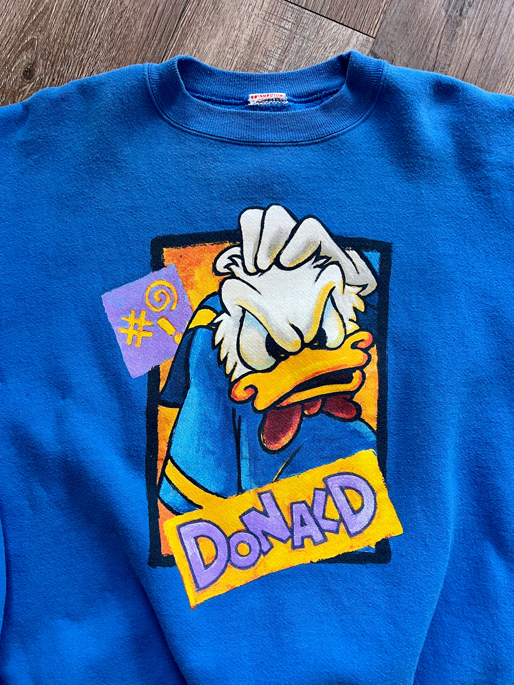 1083 -Blue Angry Donald Scratching Head Disneyland Crewneck - NT / XL