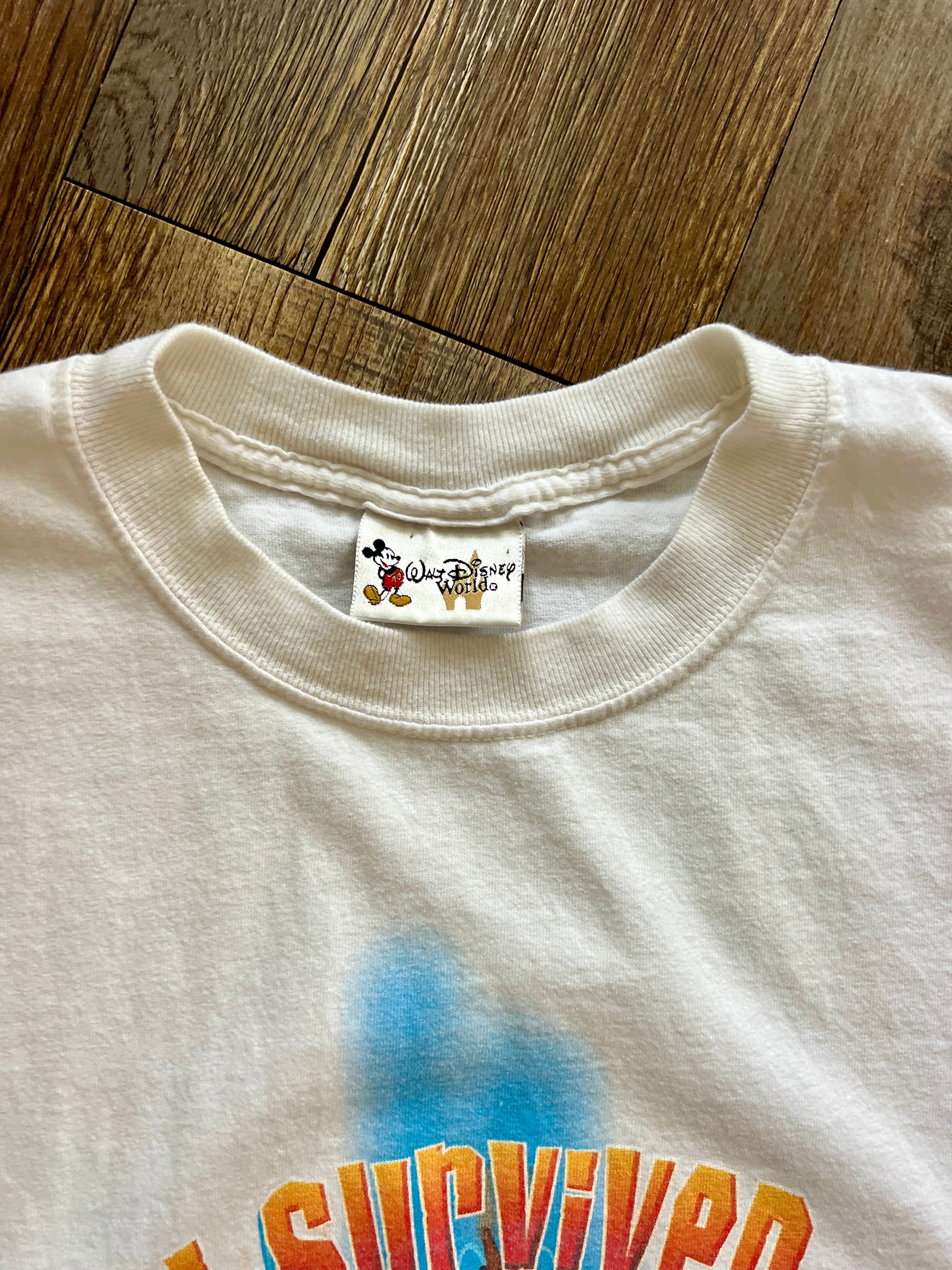 1074 -White I Survived Humunga Kowabunga Shirt - M