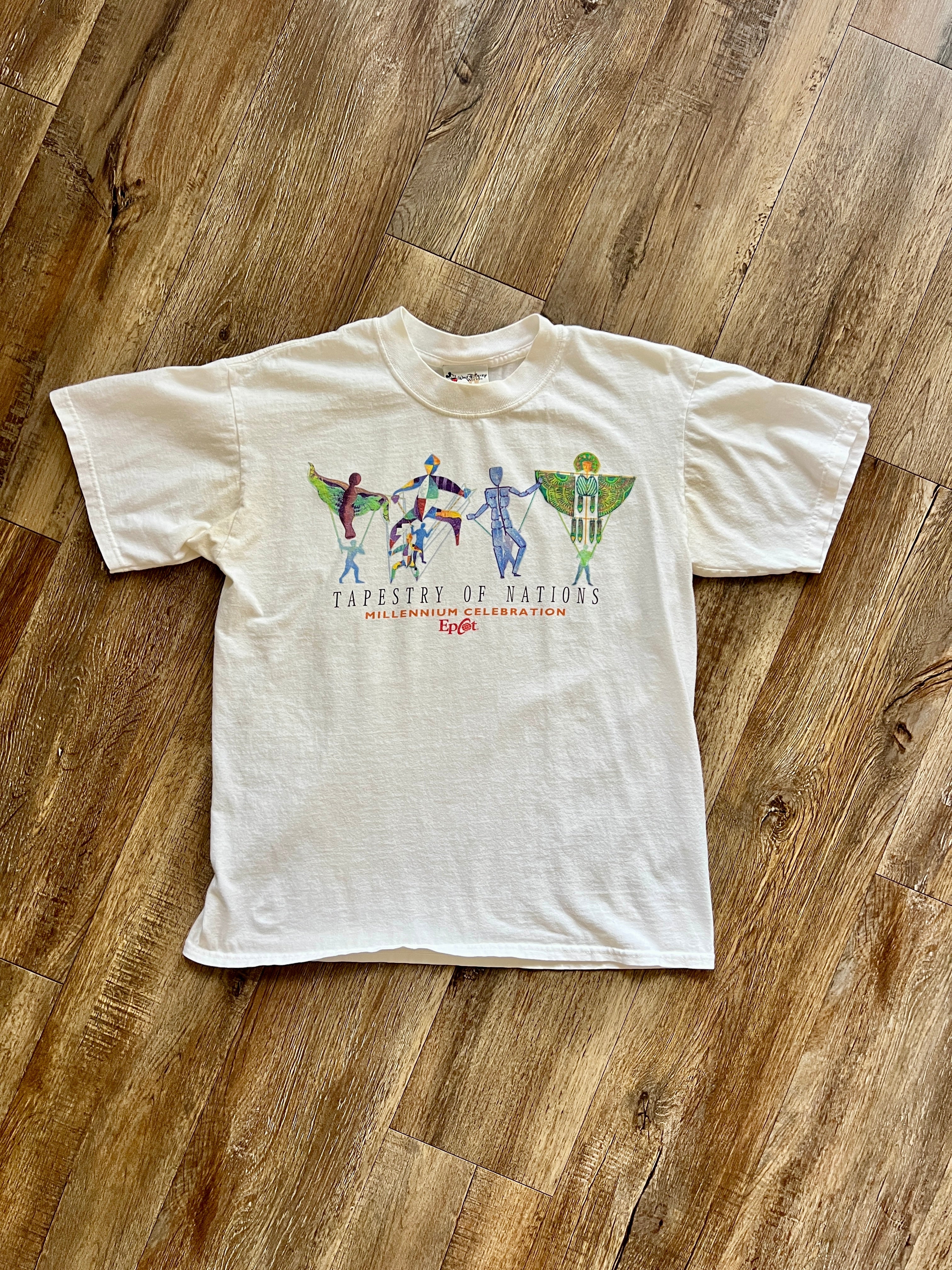 1095 -White EPCOT Tapestry of Nations Millenium Celebration Shirt - M