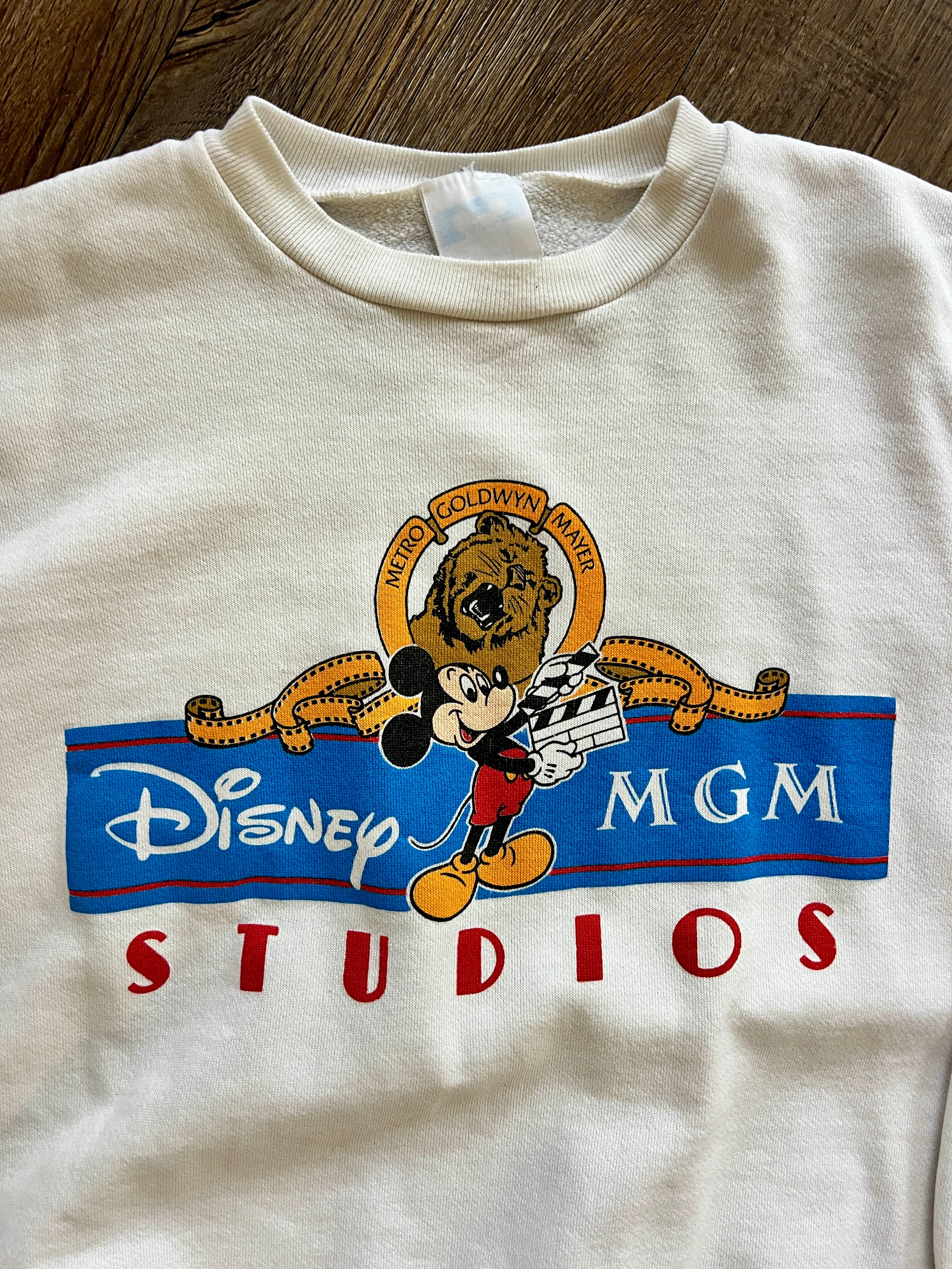 1107 -White MGM Studios Logo Mickey Crewneck