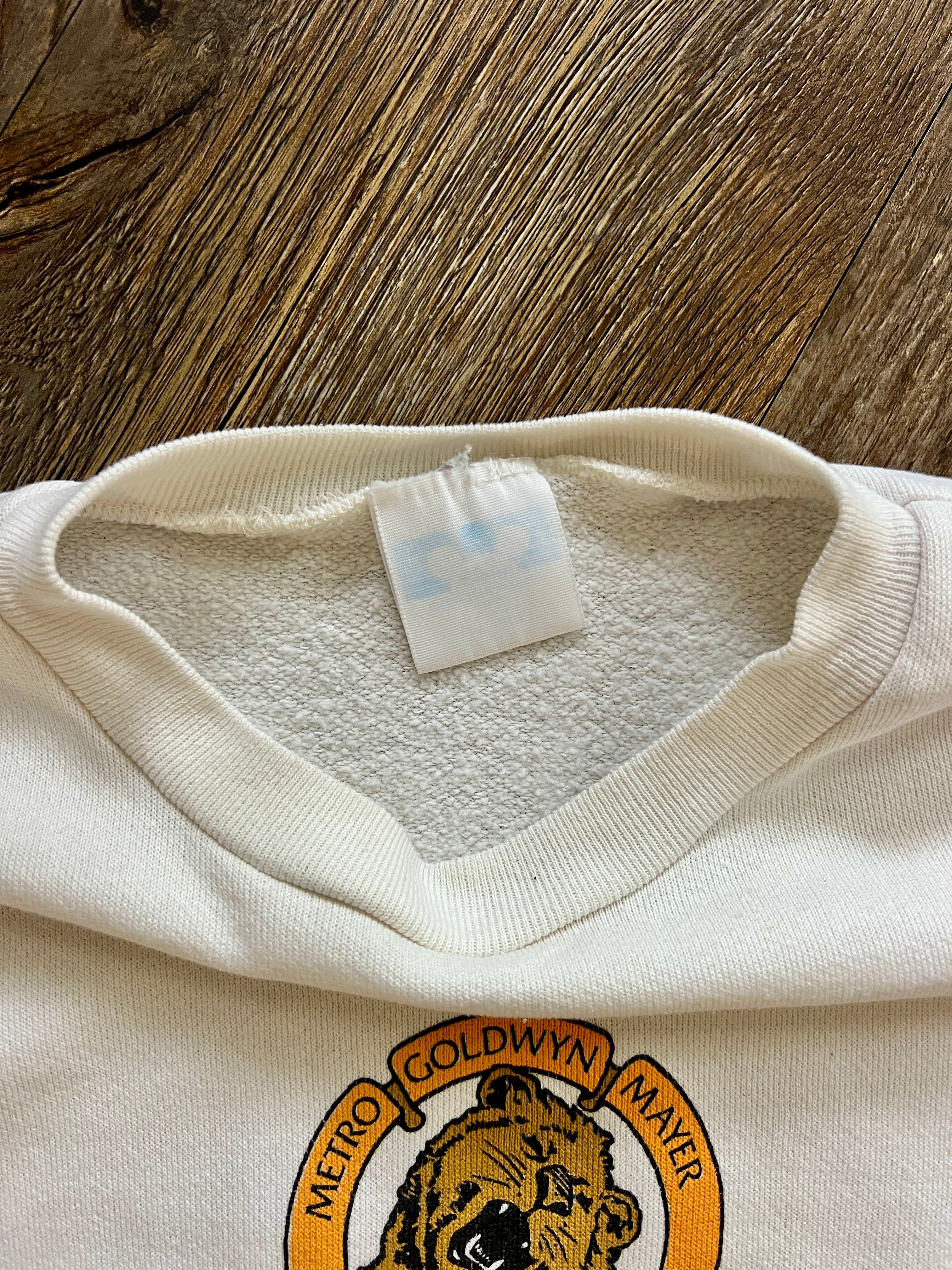 1107 -White MGM Studios Logo Mickey Crewneck