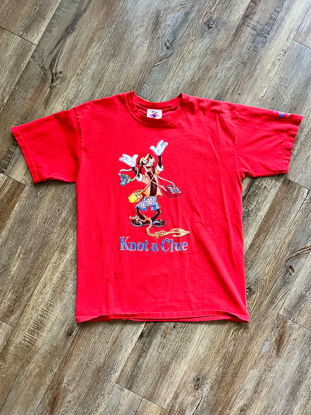 1110 -Red Tourist Goofy Knot A Clue DCL Shirt - L