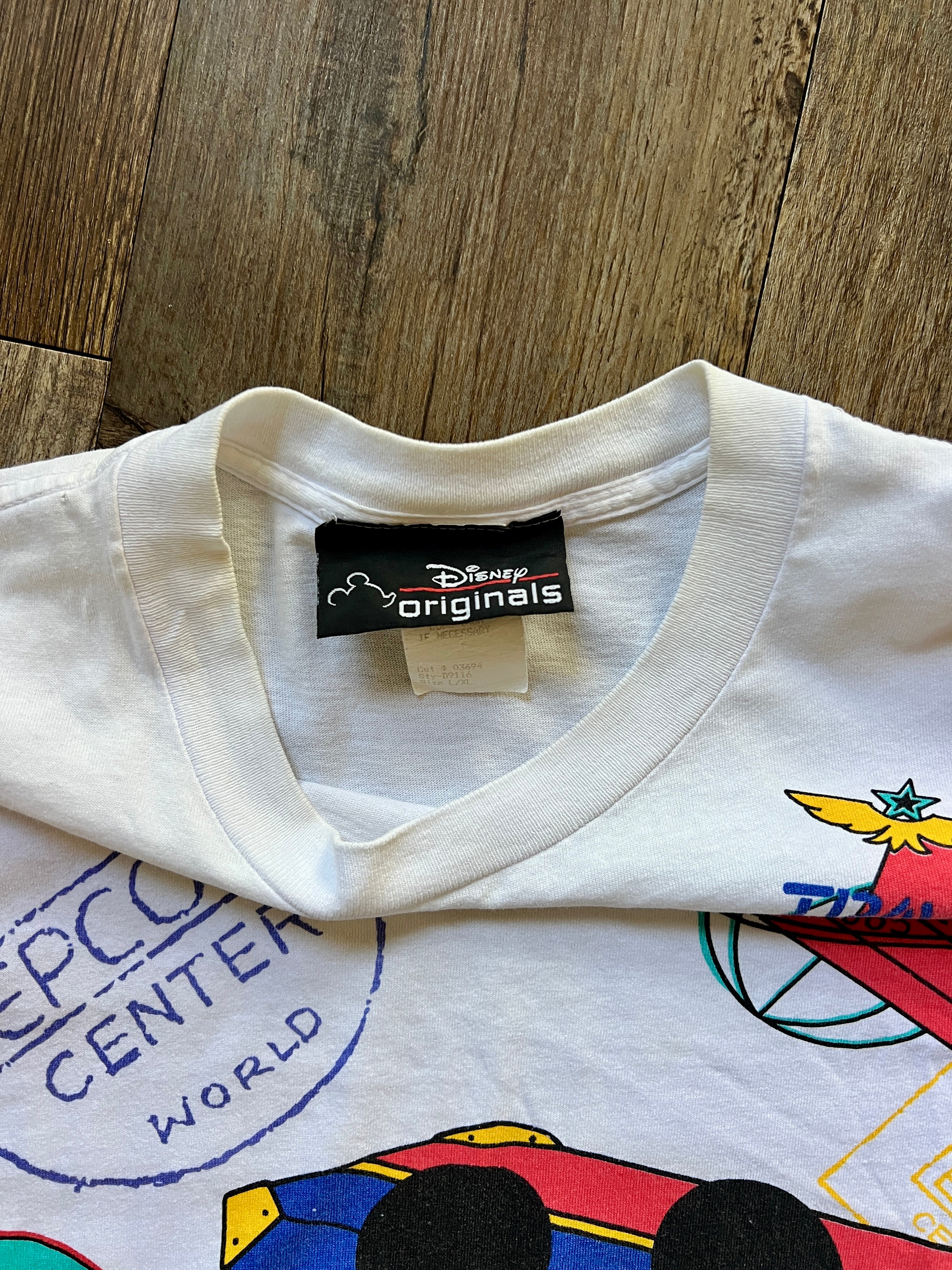 1127 -White EPCOT Center Mickey Passport Stamp Shirt - L