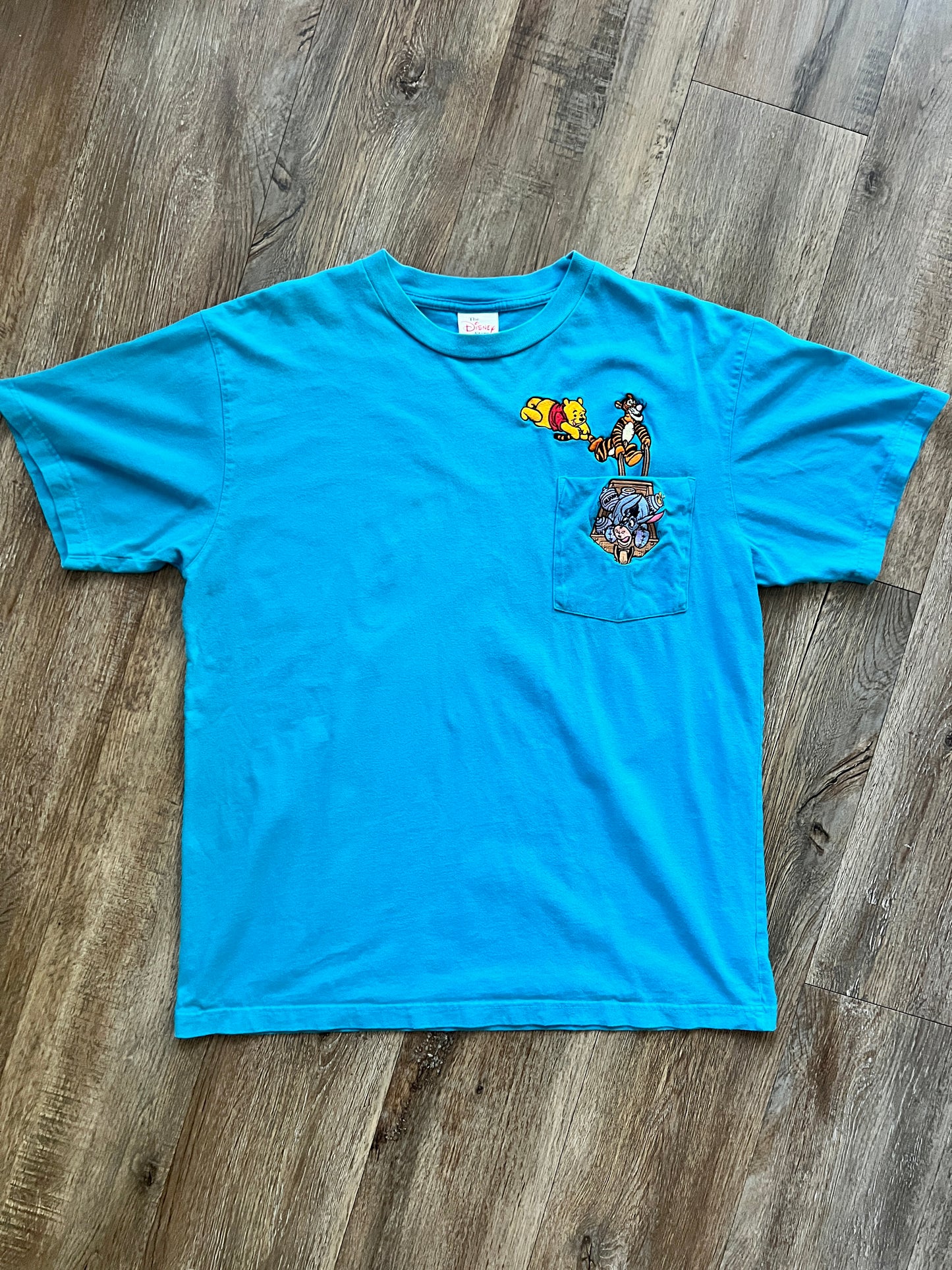 581 -Teal Embroidered WTP, Tigger, & Eeyore Wheelbarrow Pocket Tee - L