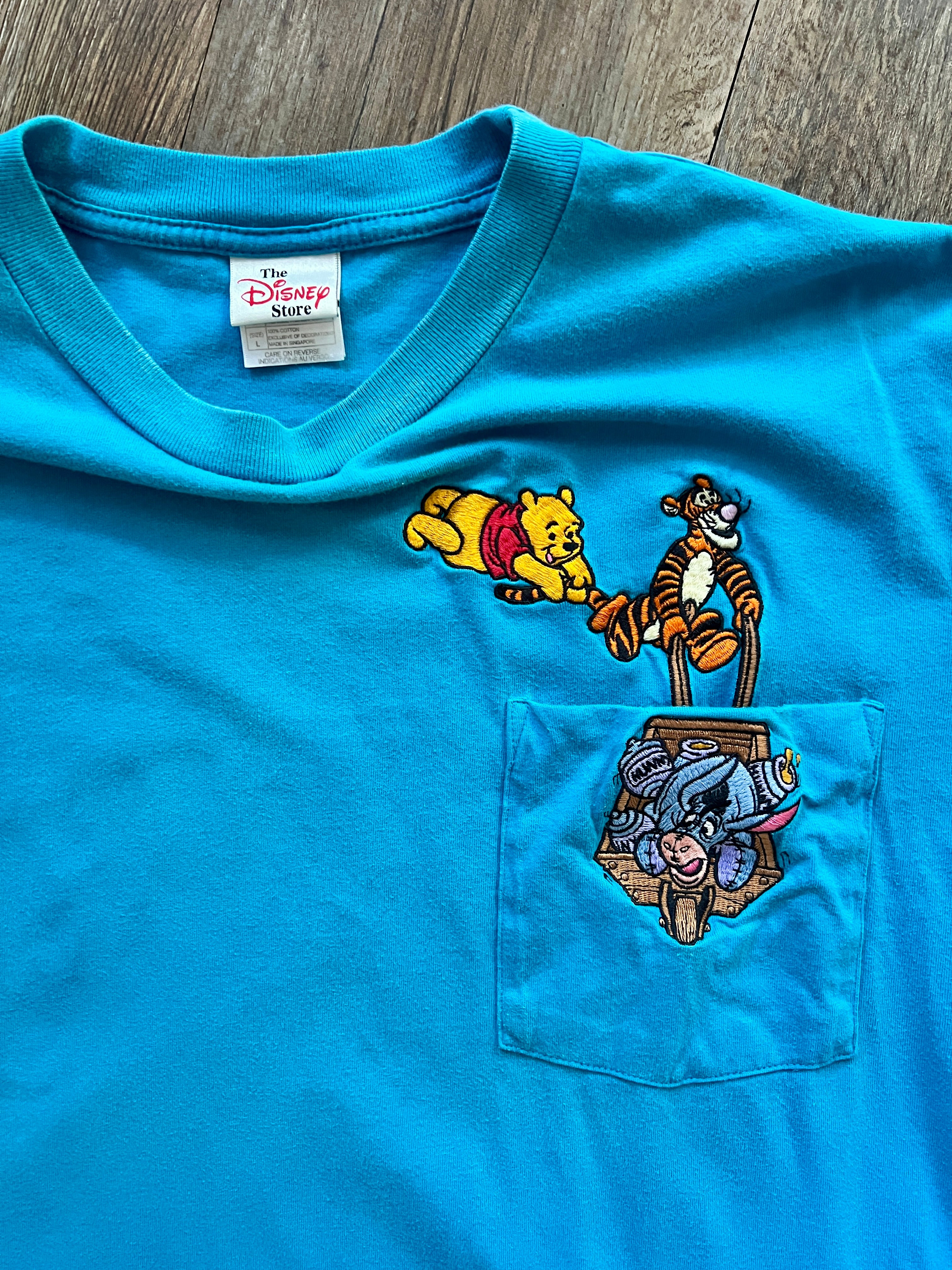 581 -Teal Embroidered WTP, Tigger, & Eeyore Wheelbarrow Pocket Tee - L