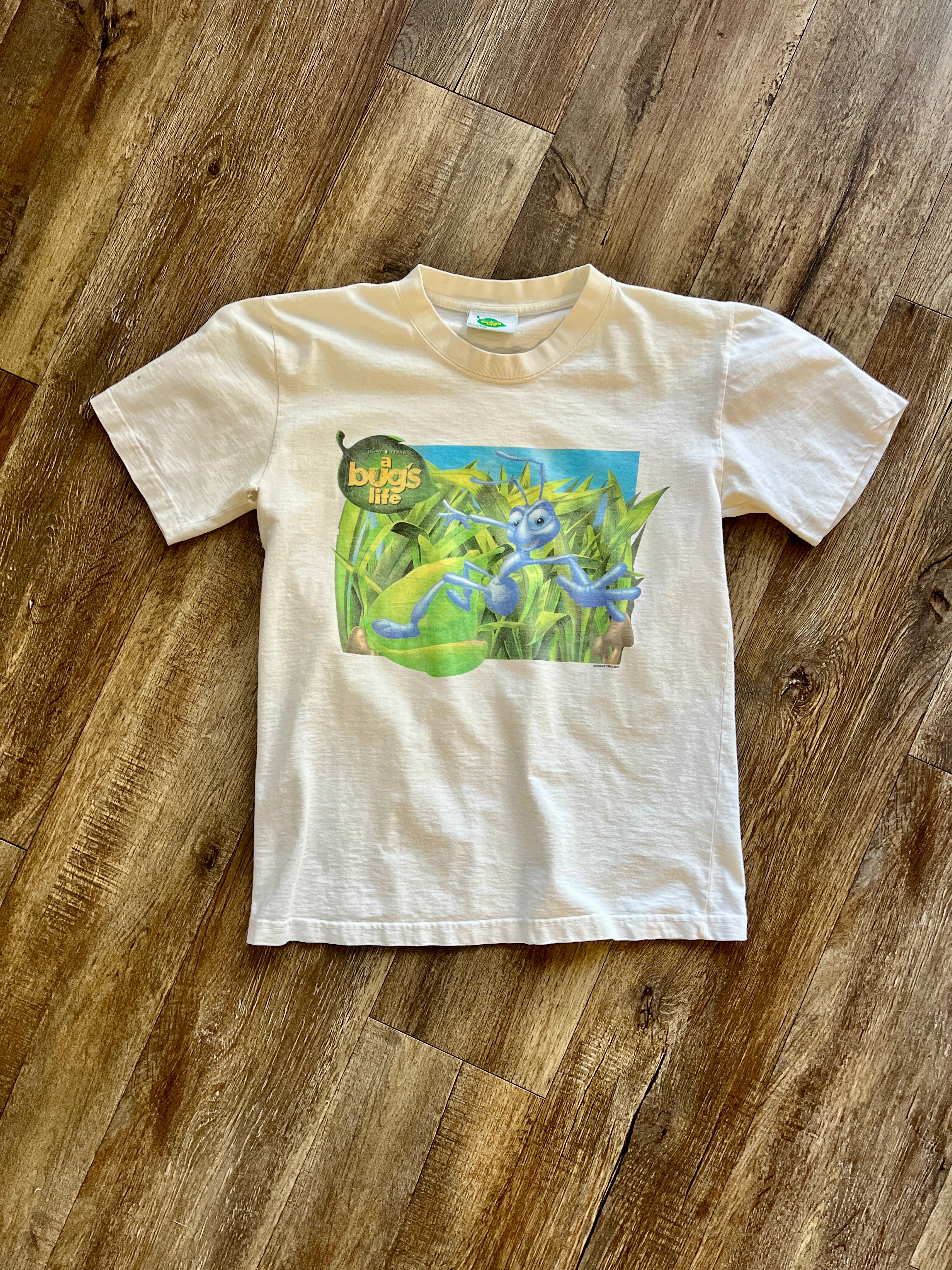 1136 -White Flik Surfing Leaf A Bug's Life Promo Shirt - M