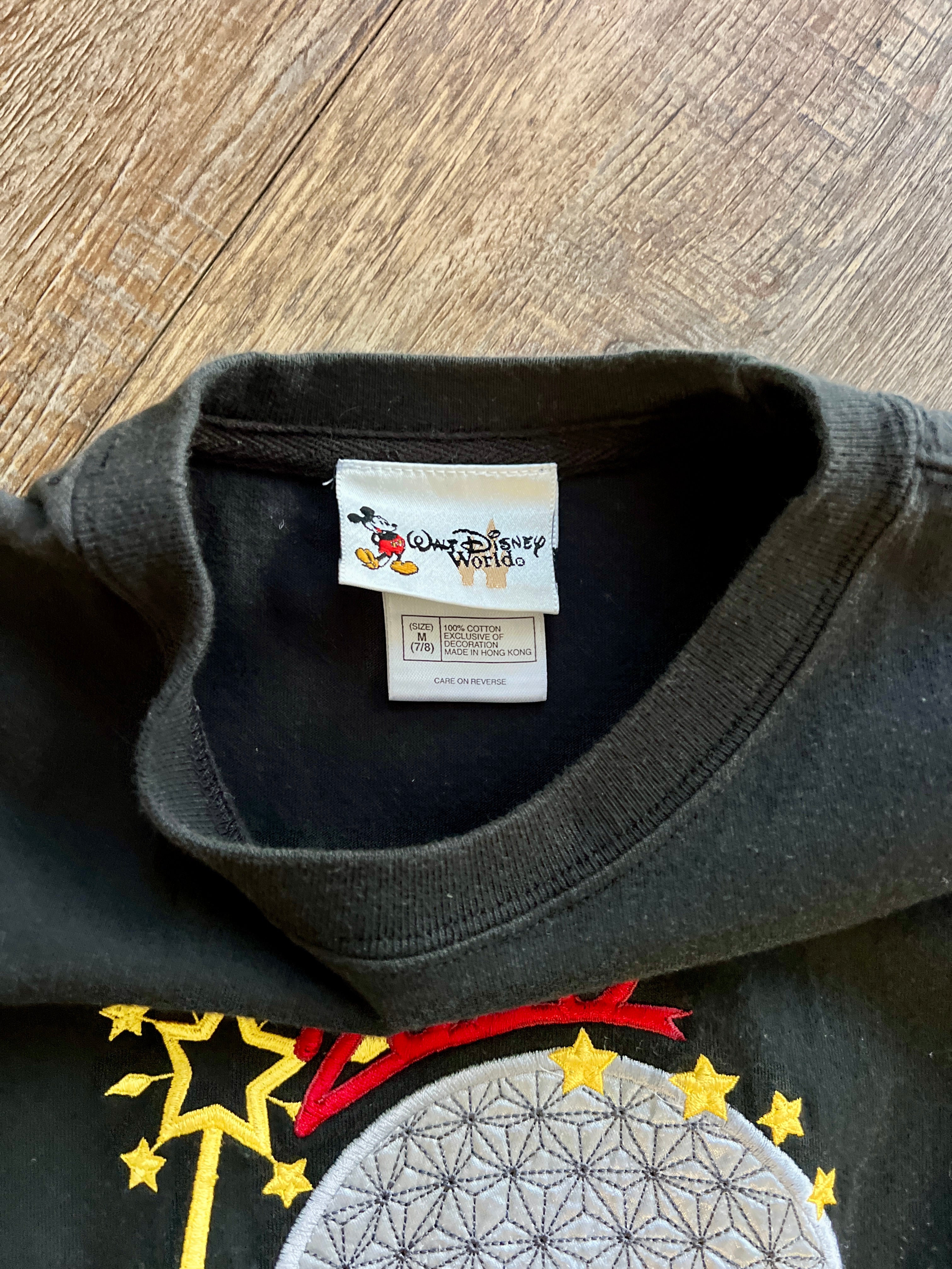 1150 - Black Appliqué Sorcerer Mickey EPCOT 2000 Celebrate the Future Shirt - YM