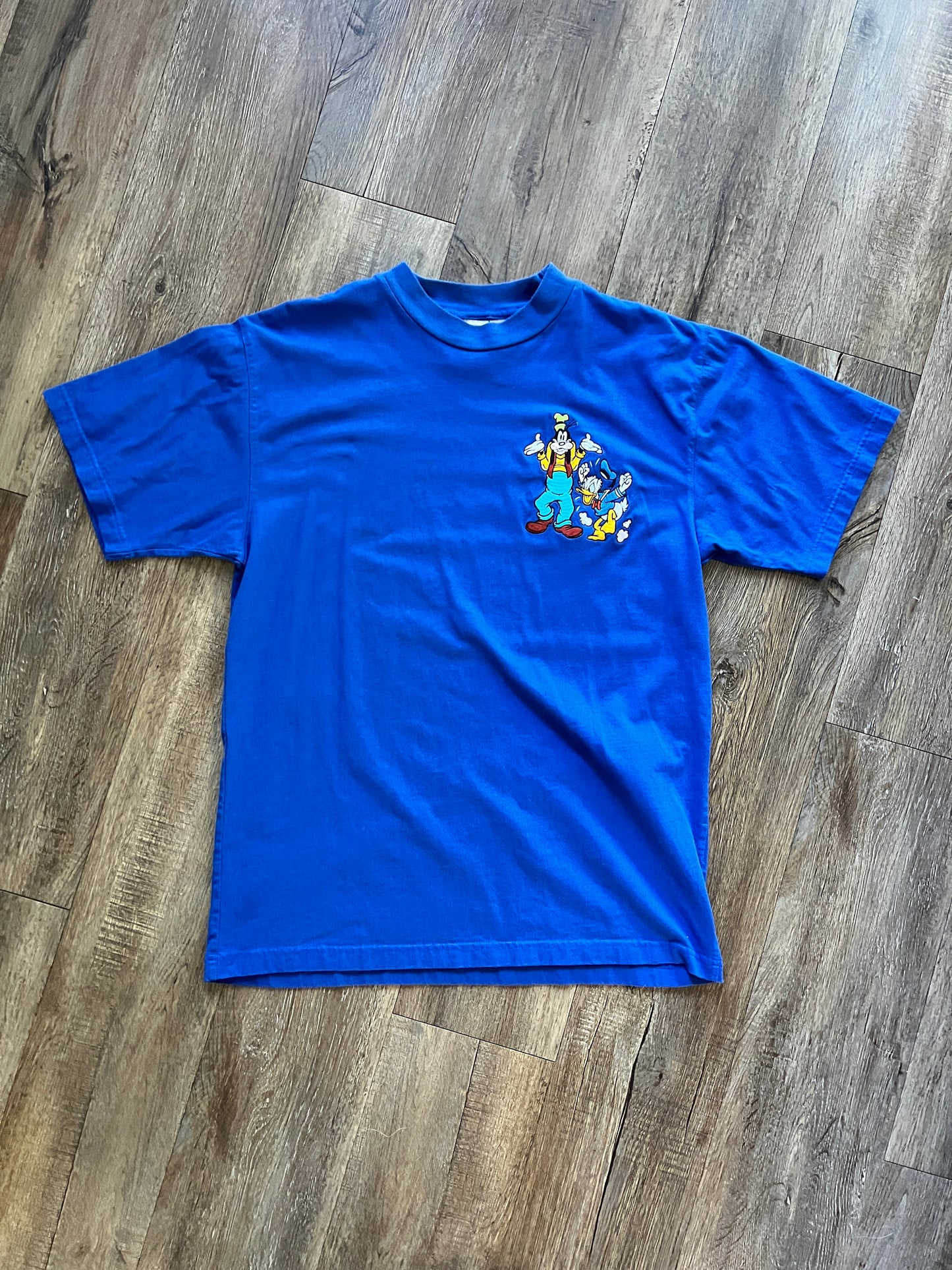 665 -Blue Embroidered Shrugging Goofy & Angry Donald Pocket Tee - L
