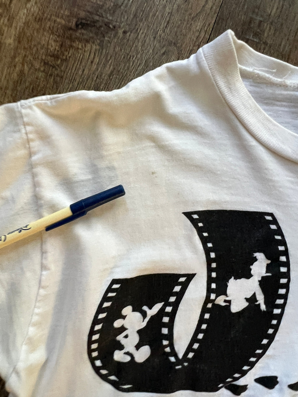 699 -White MGM Donald & Mickey Film Strip Tee