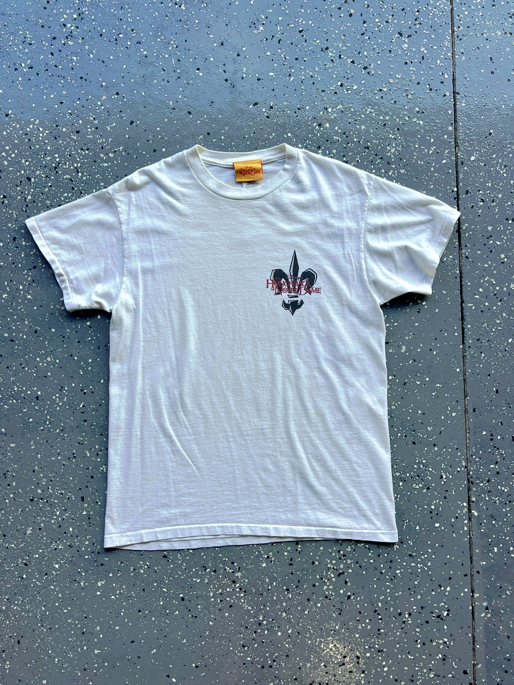 1413 - White Huinchback of Notre Dame Fleur de Lis Tee - M