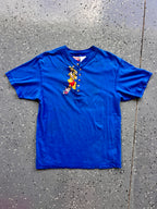 1437 - Blue Embroidered Hundred Acre Wood Swinging Piglet Henley - M